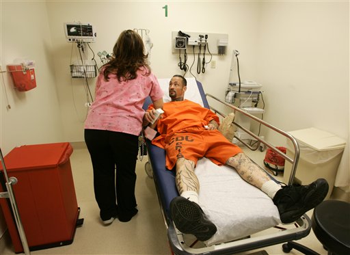 A prisoner is treaded in the new Triage and Treatment Area at San Quentin State Prison in San Quentin, California.