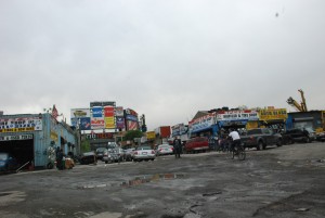 Willets Point sits in the shadows of Citi Field