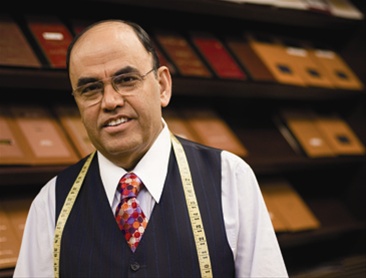 Mohan Ramchandani (News India Times) With measuring tape around his neck, it's another day of work for Mohan Ramchandani.