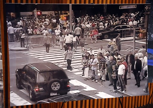 FILE - In this file photo of Sunday, May 2, 2010 at a NYPD news conference in New York, a still photo from a surveillance camera shows a bomb-laden Nissan Pathfinder driving through crowds of people in Times Square on Saturday evening May 1, 2010. The bomb could have killed many people if it hadn't malfunctioned, but still, ongoing threats don't seem to be enough to get New Yorkers to beat a retreat from the crowded streets - or from the metropolis itself. (AP Photo/Henny Ray Abrams, File)